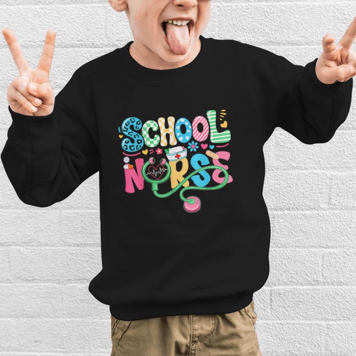 School Nurse Colorful Costume Back To School Nursing Job Graphic Kid Sweatshirt School Nurse Colorful Costume Back To School Nursing Job Graphic Kid Sweatshirt
