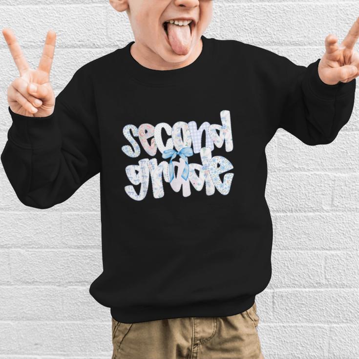 Second Grade Student Back To School Pastel Floral Bow Graphic Kid Sweatshirt Second Grade Student Back To School Pastel Floral Bow Graphic Kid Sweatshirt