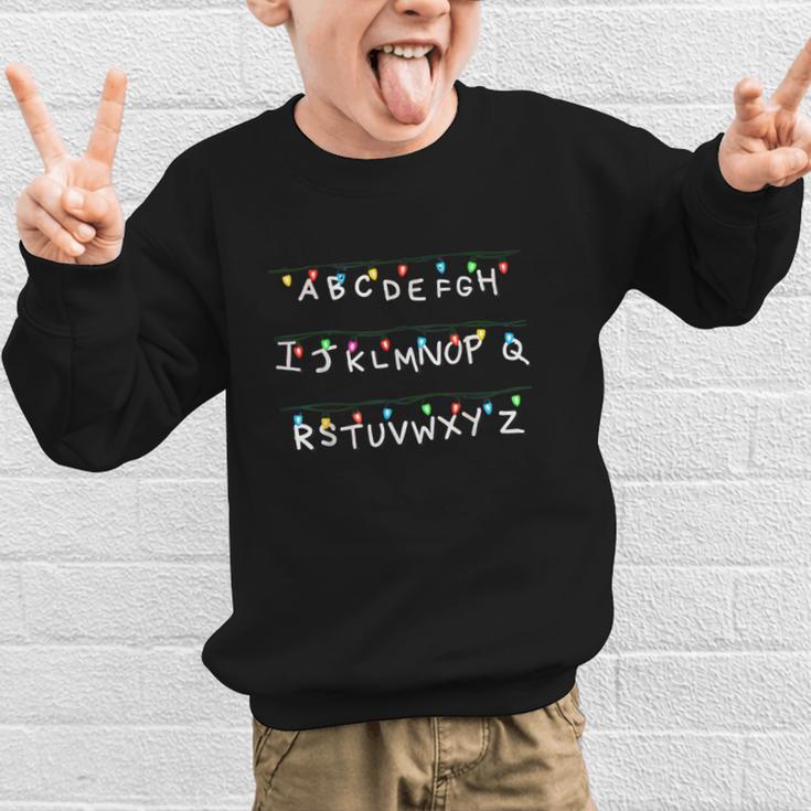 Stranger Wall Alphabet Lights Spooky Back To School Graphic Kid Sweatshirt Stranger Wall Alphabet Lights Spooky Back To School Graphic Kid Sweatshirt