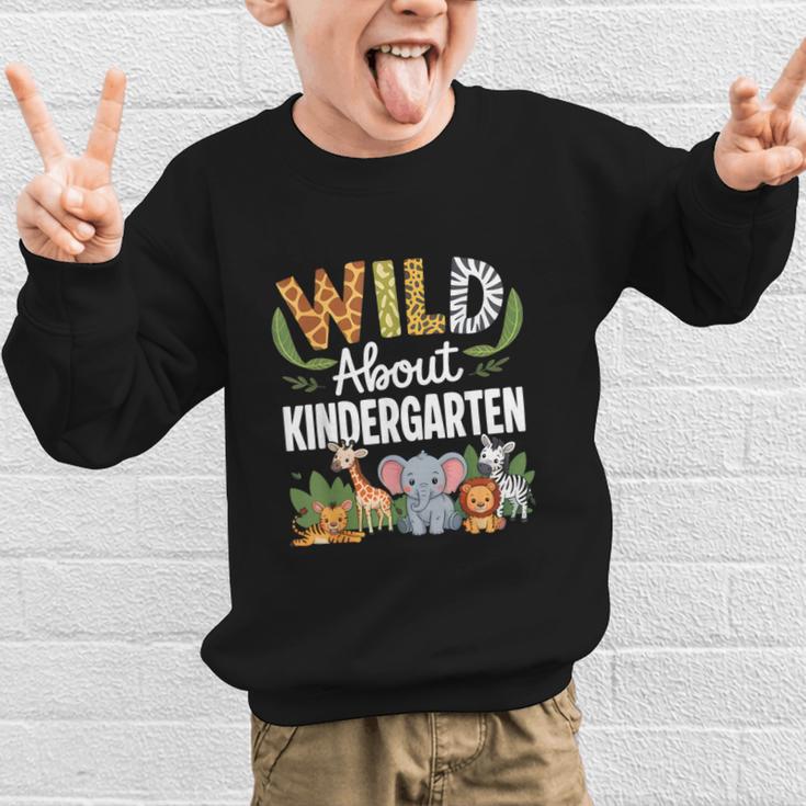 Wild About Kindergarten Back To School Jungle Theme Class Graphic Kid Sweatshirt Wild About Kindergarten Back To School Jungle Theme Class Graphic Kid Sweatshirt