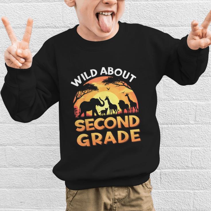 Wild About Second Grade Zoo Animals Back To School Safari Graphic Kid Sweatshirt Wild About Second Grade Zoo Animals Back To School Safari Graphic Kid Sweatshirt