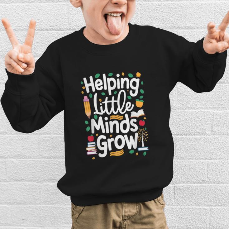 Women's Helping Little Minds Grow Back To School Apparel Graphic Kid Sweatshirt Women's Helping Little Minds Grow Back To School Apparel Graphic Kid Sweatshirt
