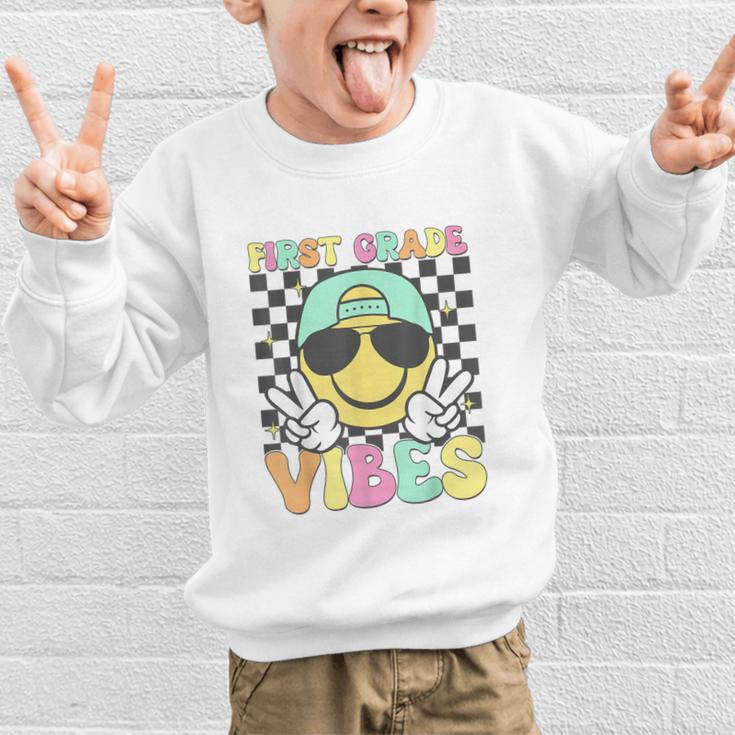 1st Grade Vibes Smile Face Back To School First Grade Graphic Kid Sweatshirt 1st Grade Vibes Smile Face Back To School First Grade Graphic Kid Sweatshirt