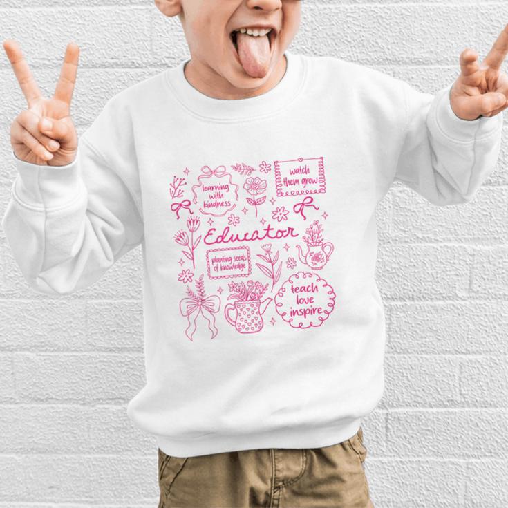 Educator Love Inspire Teach Pink Bow Back To School Graphic Kid Sweatshirt Educator Love Inspire Teach Pink Bow Back To School Graphic Kid Sweatshirt