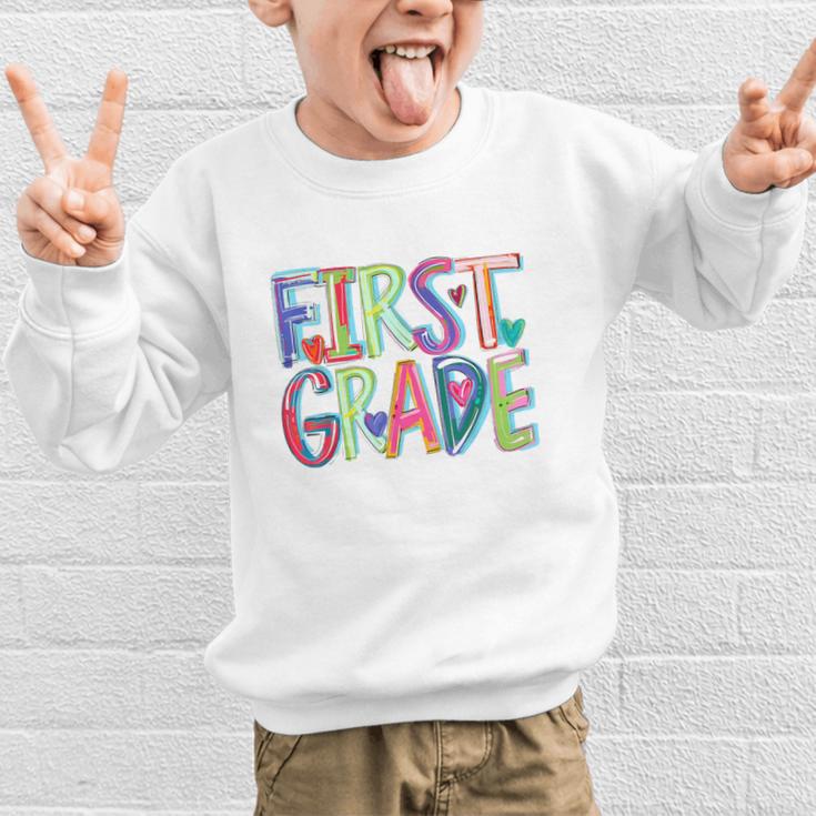 First Grade Back To School Happy First Day Of School Graphic Kid Sweatshirt First Grade Back To School Happy First Day Of School Graphic Kid Sweatshirt