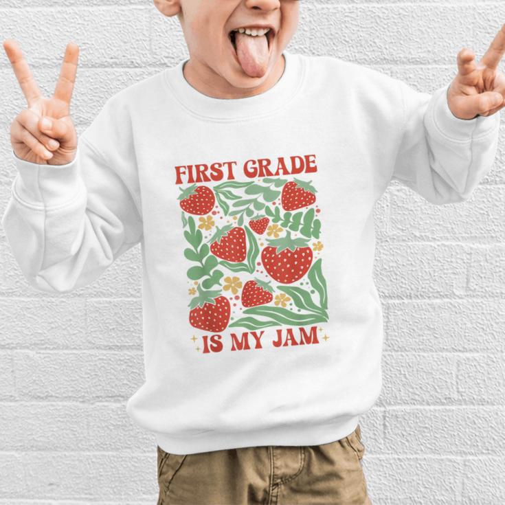 First Grade Is My Jam Boho Floral Strawberry Back To School Graphic Kid Sweatshirt First Grade Is My Jam Boho Floral Strawberry Back To School Graphic Kid Sweatshirt