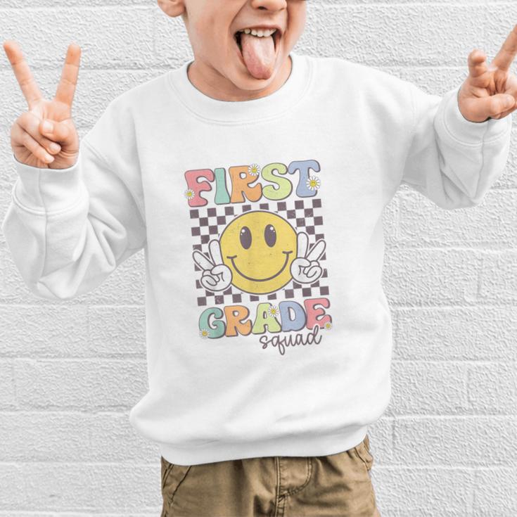 First Grade Squad Smile Face 1st Grade Back To School Graphic Kid Sweatshirt First Grade Squad Smile Face 1st Grade Back To School Graphic Kid Sweatshirt