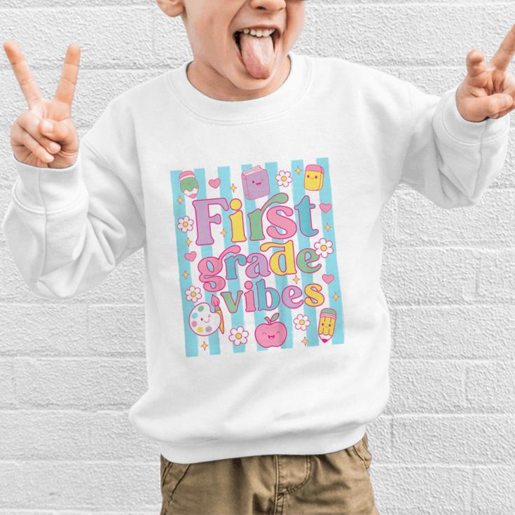 First Grade Vibes Cute Groovy Back To School 1st Grade Girls Graphic Kid Sweatshirt First Grade Vibes Cute Groovy Back To School 1st Grade Girls Graphic Kid Sweatshirt