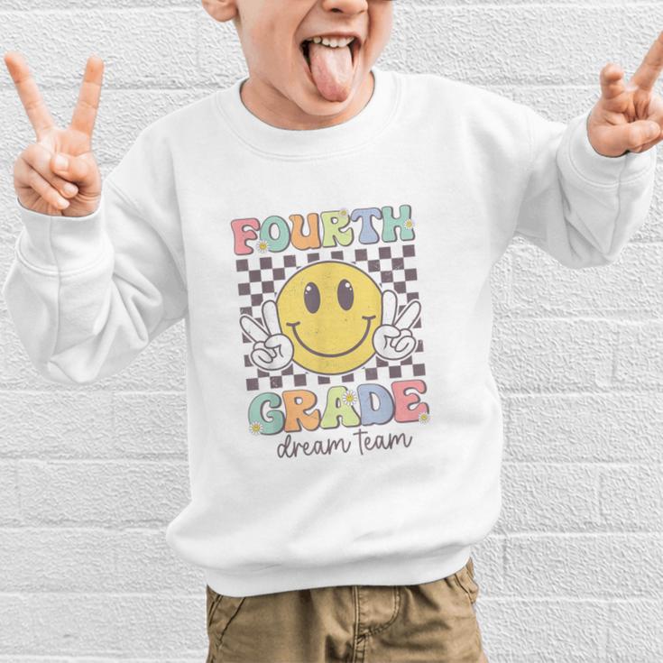 Fourth Grade Dream Team Smile Face Back To School 4th Grade Graphic Kid Sweatshirt Fourth Grade Dream Team Smile Face Back To School 4th Grade Graphic Kid Sweatshirt