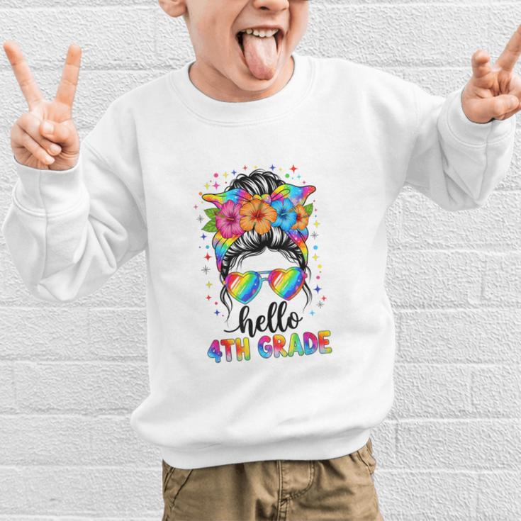 Hello 4th Grade Messy Bun Girls Back To School First Day Graphic Kid Sweatshirt Hello 4th Grade Messy Bun Girls Back To School First Day Graphic Kid Sweatshirt