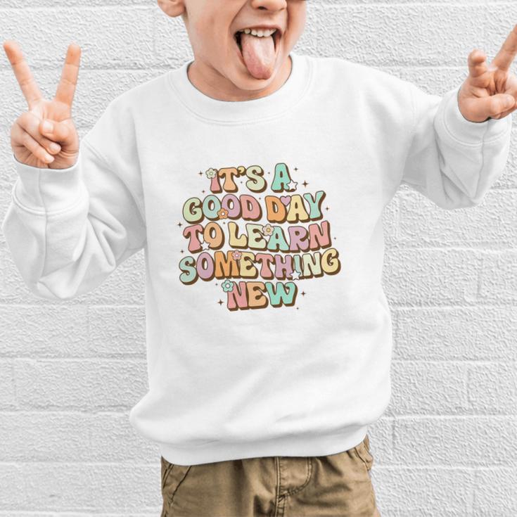 It's A Good Day To Learn Something New Retro Back To School Premium Tri-Blend Graphic Kid Sweatshirt It's A Good Day To Learn Something New Retro Back To School Premium Tri-Blend Graphic Kid Sweatshirt