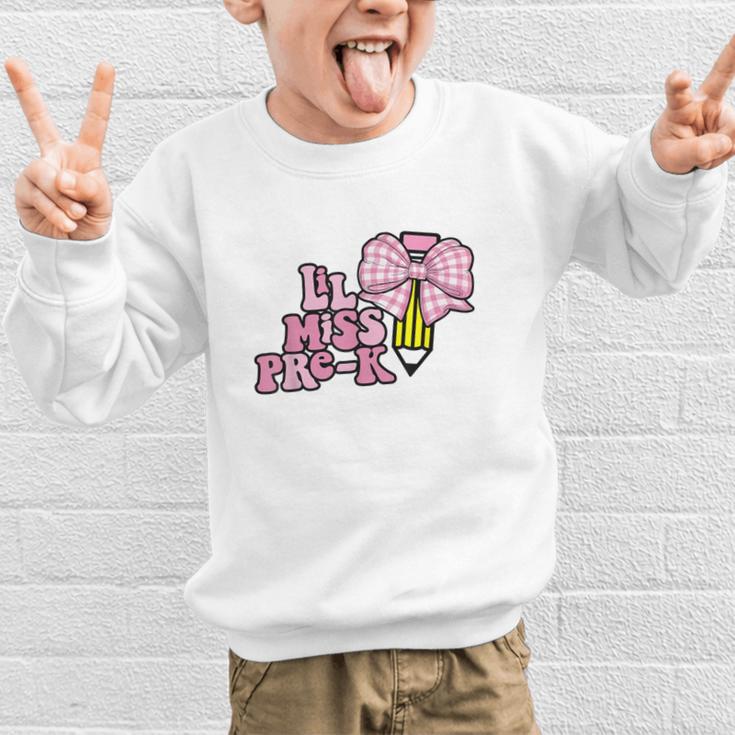 LiL Miss Pre-K Back To School Girls Coquette Bow First Day Graphic Kid Sweatshirt LiL Miss Pre-K Back To School Girls Coquette Bow First Day Graphic Kid Sweatshirt