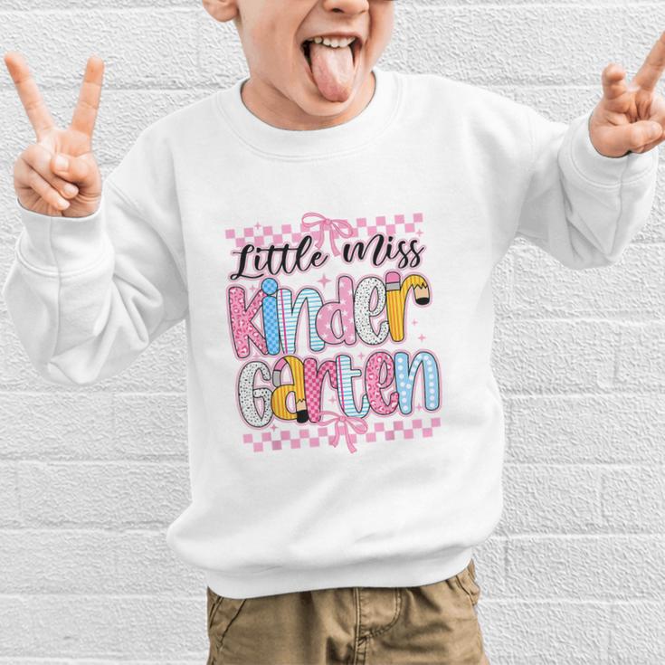 Little Miss Kindergarten Back To School Girls Coquette Bow Graphic Kid Sweatshirt Little Miss Kindergarten Back To School Girls Coquette Bow Graphic Kid Sweatshirt