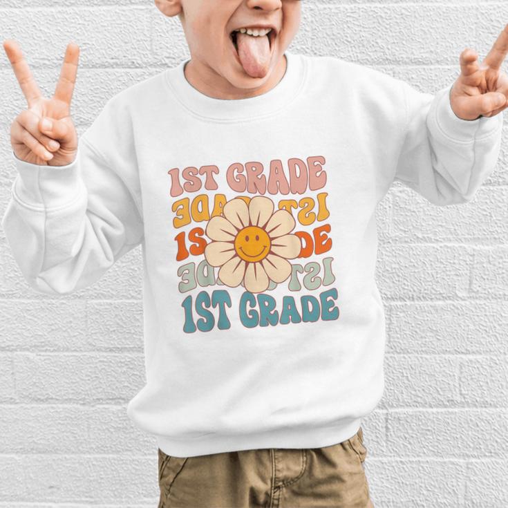Retro 1st Grade Daisy Colorful Back To School First Grade Graphic Kid Sweatshirt Retro 1st Grade Daisy Colorful Back To School First Grade Graphic Kid Sweatshirt