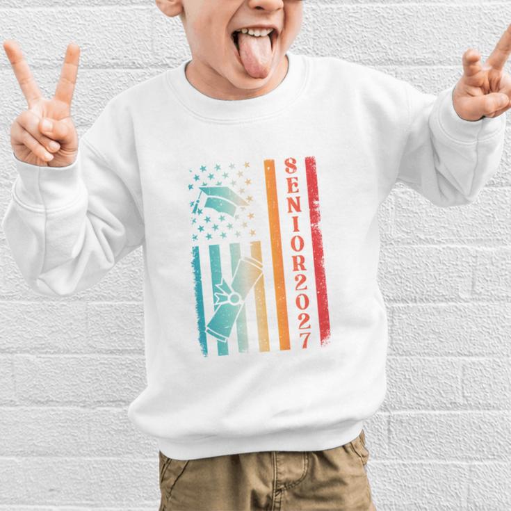 Senior 2027 Class Of 2027 Graduation USA Flag Back To School Performance Graphic Kid Sweatshirt Senior 2027 Class Of 2027 Graduation USA Flag Back To School Performance Graphic Kid Sweatshirt