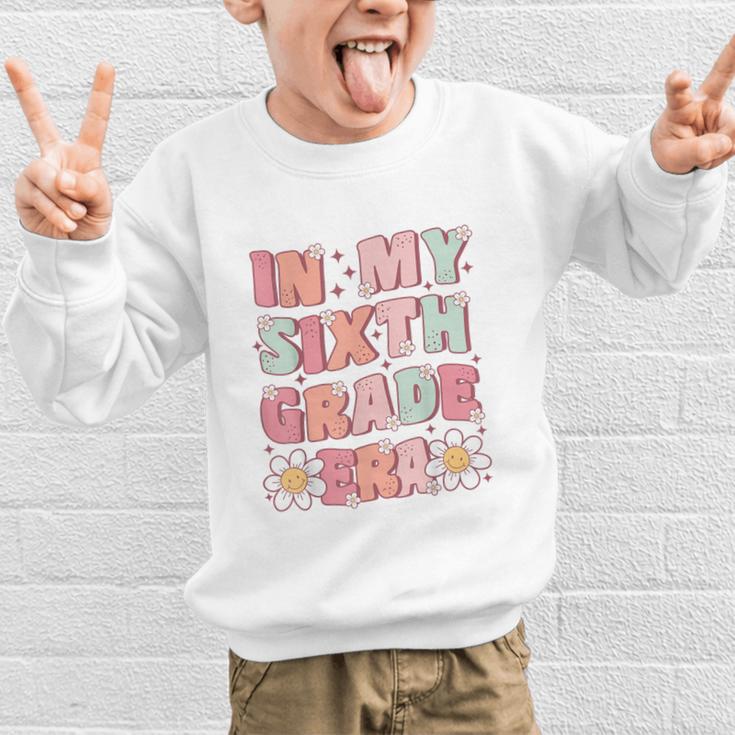 In My Sixth Grade Era Cute Groovy 6th Grade Back To School Graphic Kid Sweatshirt In My Sixth Grade Era Cute Groovy 6th Grade Back To School Graphic Kid Sweatshirt