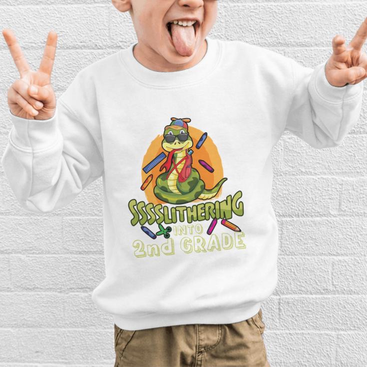 Slithering Into 2nd Grade First Day Back To School Snake Performance Graphic Kid Sweatshirt Slithering Into 2nd Grade First Day Back To School Snake Performance Graphic Kid Sweatshirt