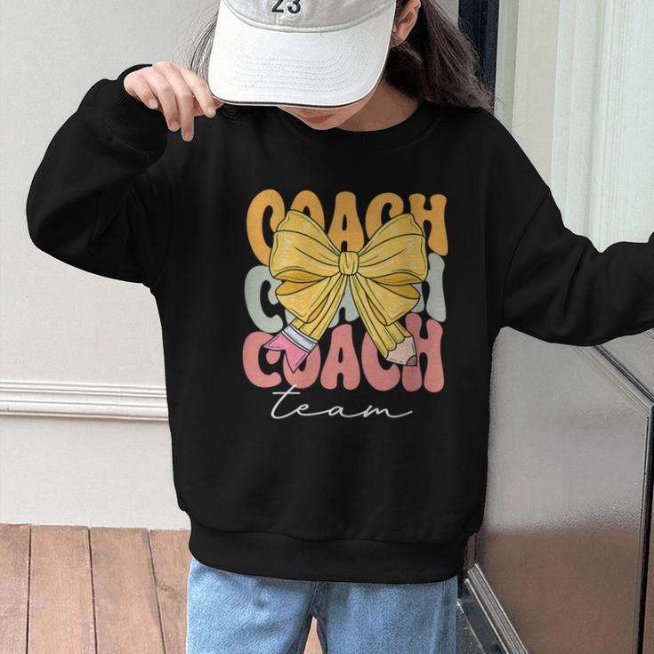 Coach Team Groovy Coquette Bow Cute Back To School Graphic Kid Sweatshirt Coach Team Groovy Coquette Bow Cute Back To School Graphic Kid Sweatshirt