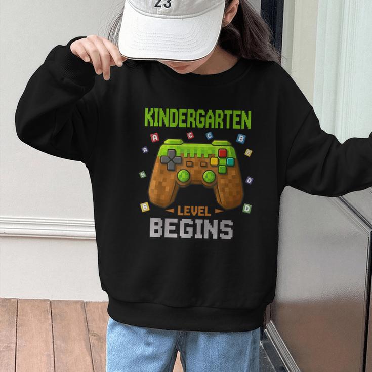 First Day Of Kindergarten Level Begins Back To School Graphic Kid Sweatshirt First Day Of Kindergarten Level Begins Back To School Graphic Kid Sweatshirt