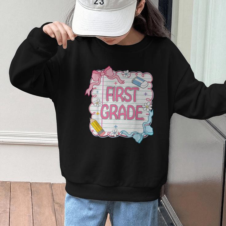 First Grade Back To School Girls Kids Coquette Bows Retro Graphic Kid Sweatshirt First Grade Back To School Girls Kids Coquette Bows Retro Graphic Kid Sweatshirt