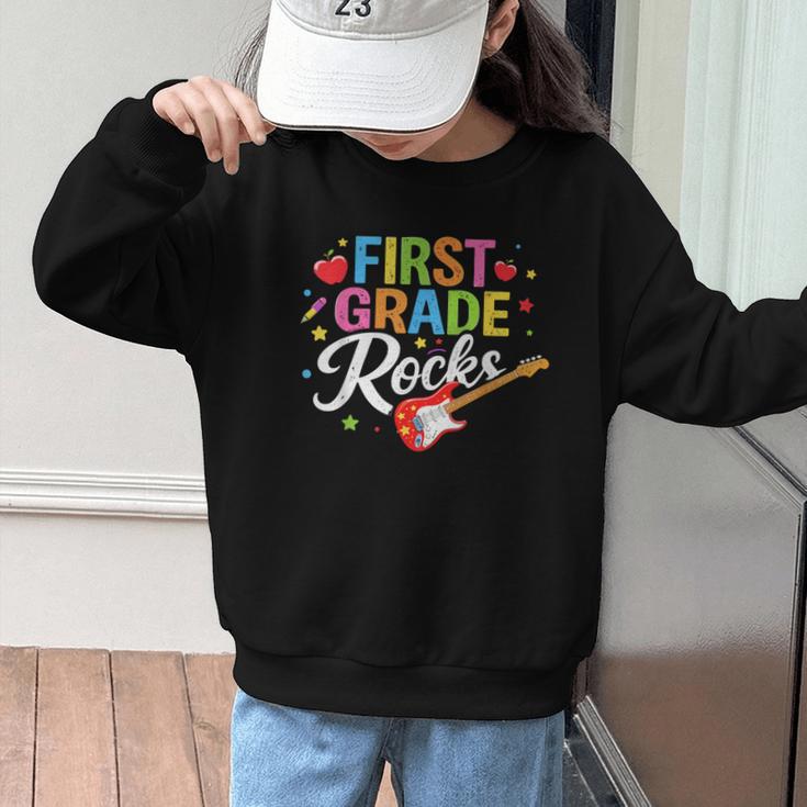 First Grade Rocks Colorful Back To School Guitar Graphic Kid Sweatshirt First Grade Rocks Colorful Back To School Guitar Graphic Kid Sweatshirt