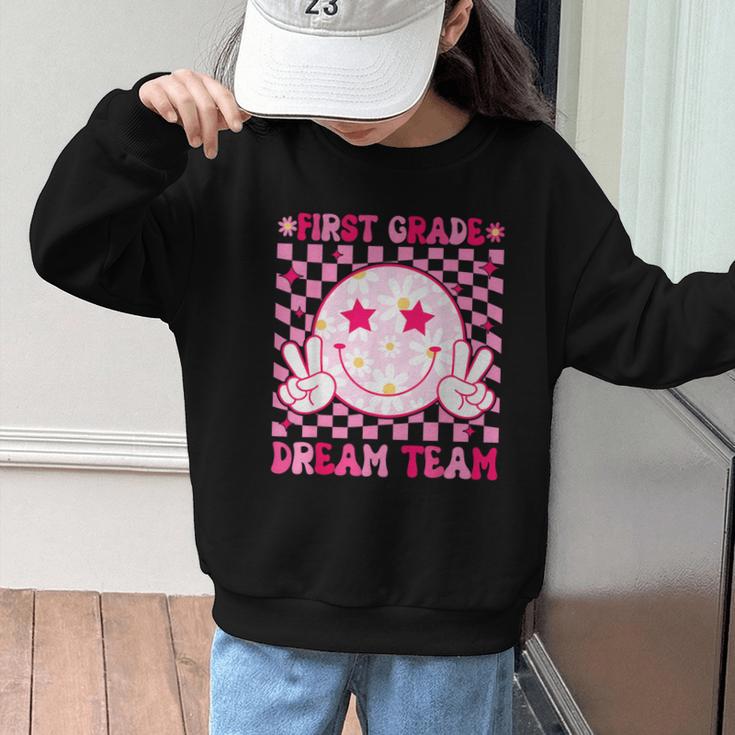 Groovy First Grade Dream Team Back To School 1st Grade Squad Graphic Kid Sweatshirt Groovy First Grade Dream Team Back To School 1st Grade Squad Graphic Kid Sweatshirt