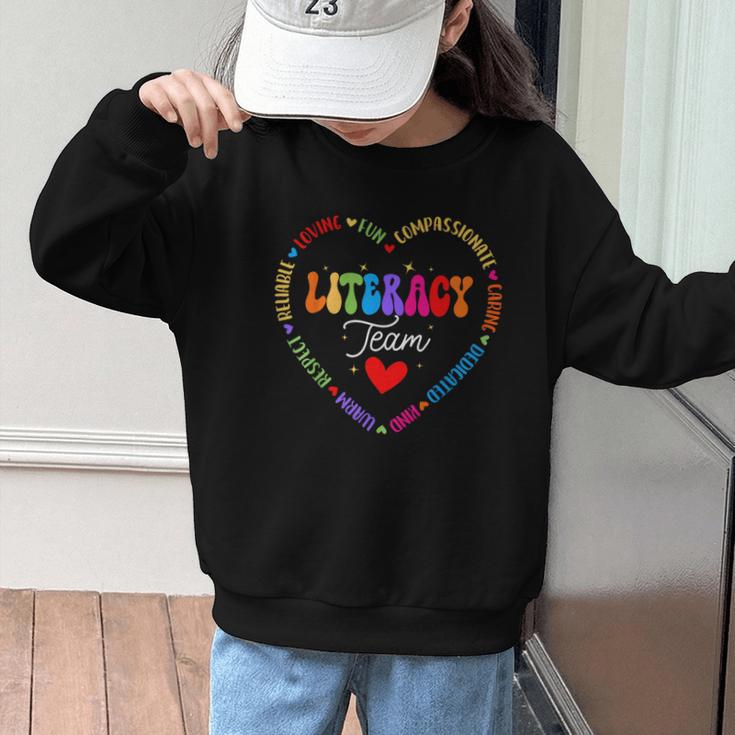Groovy Literacy Team Reading Appreciation Back To School Graphic Kid Sweatshirt Groovy Literacy Team Reading Appreciation Back To School Graphic Kid Sweatshirt