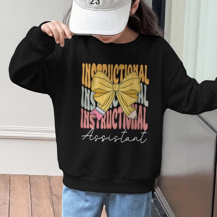 Instructional Assistant Groovy Coquette Bow Back To School Graphic Kid Sweatshirt Instructional Assistant Groovy Coquette Bow Back To School Graphic Kid Sweatshirt