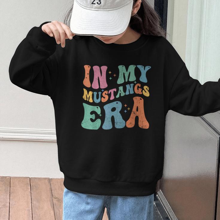 In My Mustangs Era Back To School Spirit Game Retro Groovy Graphic Kid Sweatshirt In My Mustangs Era Back To School Spirit Game Retro Groovy Graphic Kid Sweatshirt