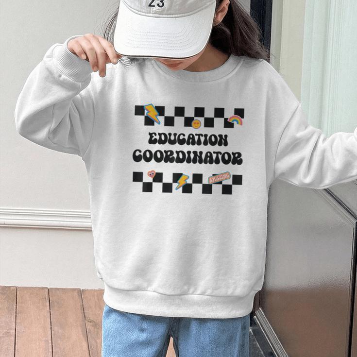 Education Coordinator Groovy Back To School Checkered Graphic Kid Sweatshirt Education Coordinator Groovy Back To School Checkered Graphic Kid Sweatshirt