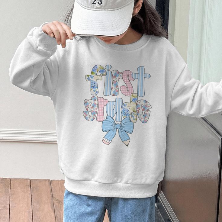 First Grade Coquette Bow Pencil First Day Back To School Performance Graphic Kid Sweatshirt First Grade Coquette Bow Pencil First Day Back To School Performance Graphic Kid Sweatshirt