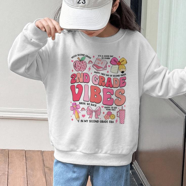 Girls 2nd Grade Vibes Coquette Pink Bow Back To School Graphic Kid Sweatshirt Girls 2nd Grade Vibes Coquette Pink Bow Back To School Graphic Kid Sweatshirt