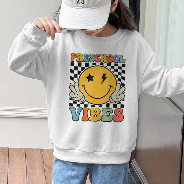 Preschool Vibes Retro Groovy Back To School Pre-K Graphic Kid Sweatshirt Preschool Vibes Retro Groovy Back To School Pre-K Graphic Kid Sweatshirt