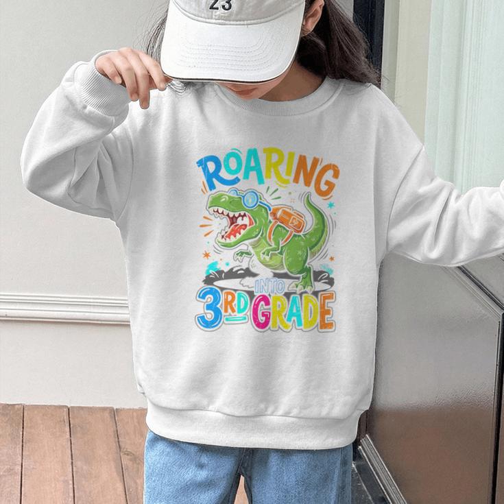 Roaring Into 3rd Grade Back To School Dinosaurus T-Rex Premium Tri-Blend Graphic Kid Sweatshirt Roaring Into 3rd Grade Back To School Dinosaurus T-Rex Premium Tri-Blend Graphic Kid Sweatshirt