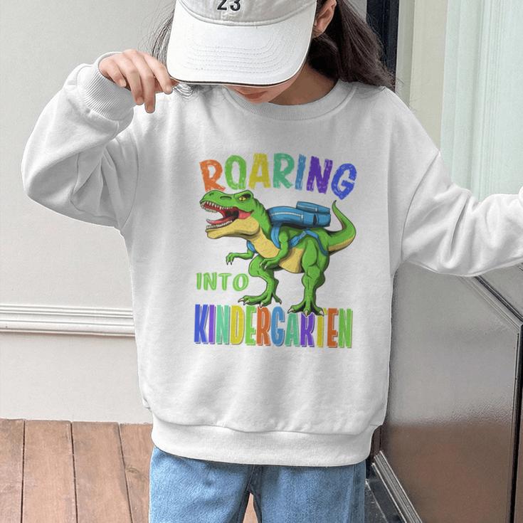 Roaring Into Kindergarten DinosaurRex Back To School Boys Performance Graphic Kid Sweatshirt Roaring Into Kindergarten DinosaurRex Back To School Boys Performance Graphic Kid Sweatshirt