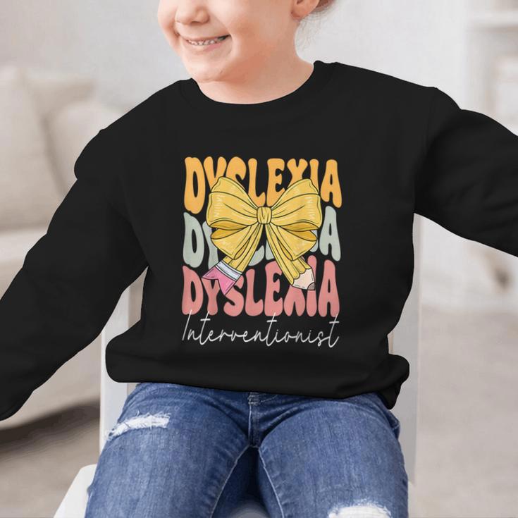 Dyslexia Interventionist Groovy Coquette Bow Back To School Graphic Kid Sweatshirt