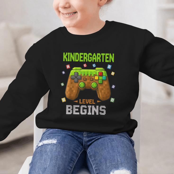 First Day Of Kindergarten Level Begins Back To School Graphic Kid Sweatshirt First Day Of Kindergarten Level Begins Back To School Graphic Kid Sweatshirt