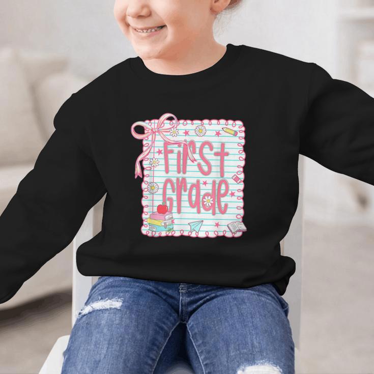 First Grade Coquette Bow Pink Preppy Back To School Girls Graphic Kid Sweatshirt First Grade Coquette Bow Pink Preppy Back To School Girls Graphic Kid Sweatshirt