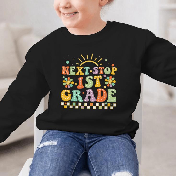Next Stop 1st Grade Groovy Retro First Grade Back To School Graphic Kid Sweatshirt