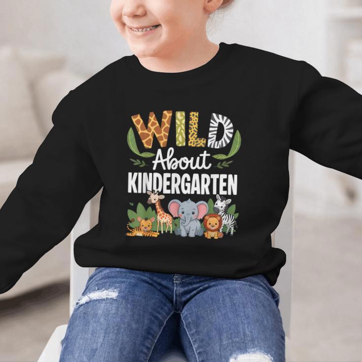 Wild About Kindergarten Back To School Jungle Theme Class Graphic Kid Sweatshirt Wild About Kindergarten Back To School Jungle Theme Class Graphic Kid Sweatshirt