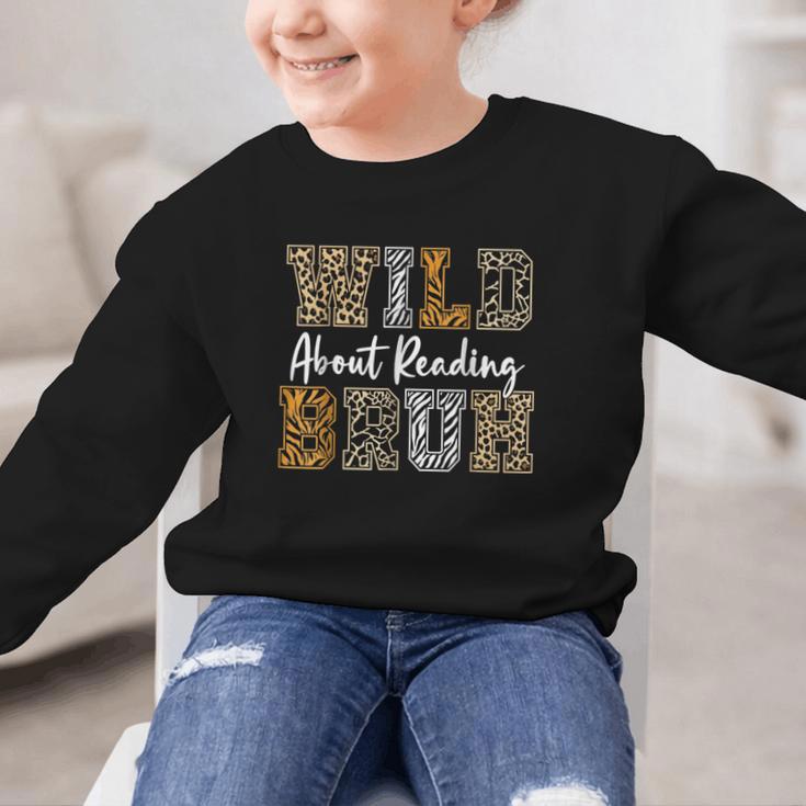 Wild About Reading Kid Love Wild Animal Books Back To School Graphic Kid Sweatshirt Wild About Reading Kid Love Wild Animal Books Back To School Graphic Kid Sweatshirt