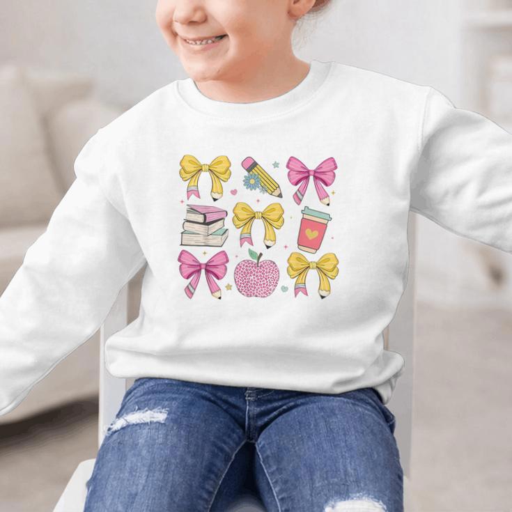 Apple Coquette Bow Books First Day Of School Back To School Graphic Kid Sweatshirt Apple Coquette Bow Books First Day Of School Back To School Graphic Kid Sweatshirt