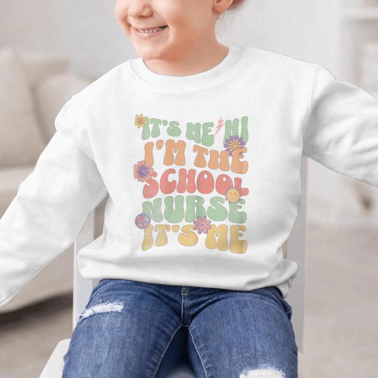 Back To School Nurse It's Me Hi I'm The School Nurse Graphic Kid Sweatshirt Back To School Nurse It's Me Hi I'm The School Nurse Graphic Kid Sweatshirt