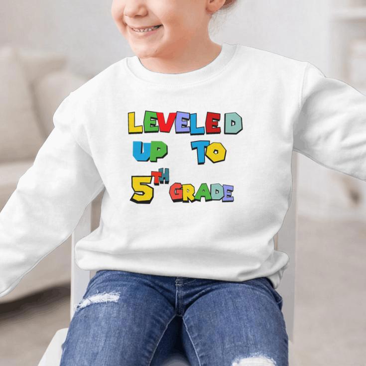 Leveled Up To 5th Grade Back To School Kids Boys Premium Tri-Blend Graphic Kid Sweatshirt Leveled Up To 5th Grade Back To School Kids Boys Premium Tri-Blend Graphic Kid Sweatshirt