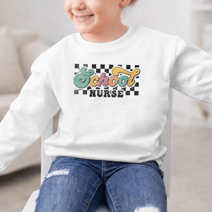Retro Checkered School Nurse Squad Back To School Graduation Graphic Kid Sweatshirt Retro Checkered School Nurse Squad Back To School Graduation Graphic Kid Sweatshirt