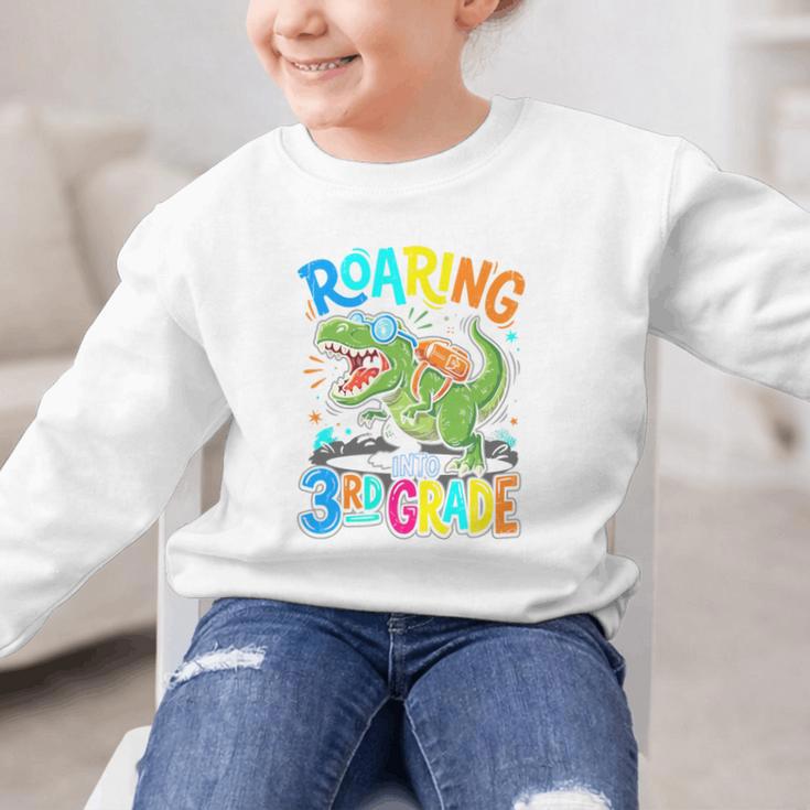 Roaring Into 3rd Grade Back To School Dinosaurus T-Rex Premium Tri-Blend Graphic Kid Sweatshirt Roaring Into 3rd Grade Back To School Dinosaurus T-Rex Premium Tri-Blend Graphic Kid Sweatshirt