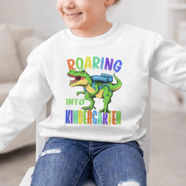 Roaring Into Kindergarten DinosaurRex Back To School Boys Performance Graphic Kid Sweatshirt Roaring Into Kindergarten DinosaurRex Back To School Boys Performance Graphic Kid Sweatshirt