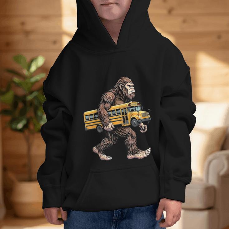 Bigfoot Carrying School Bus Sasquatch Back To School Graphic Kid Hoodie