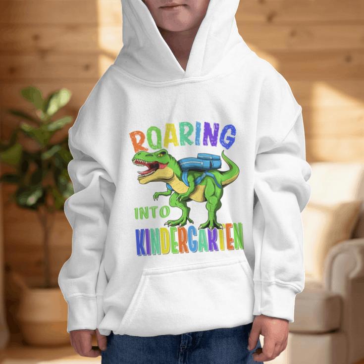 Roaring Into Kindergarten DinosaurRex Back To School Boys Performance Graphic Kid Hoodie Roaring Into Kindergarten DinosaurRex Back To School Boys Performance Graphic Kid Hoodie