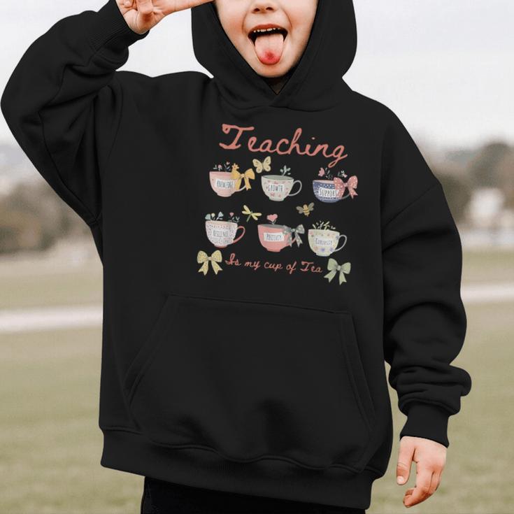 Teaching Is My Cup Of Tea Coquette Bow Floral Back To School Graphic Kid Hoodie Teaching Is My Cup Of Tea Coquette Bow Floral Back To School Graphic Kid Hoodie